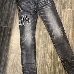 Amiri grey black appliqué jeans